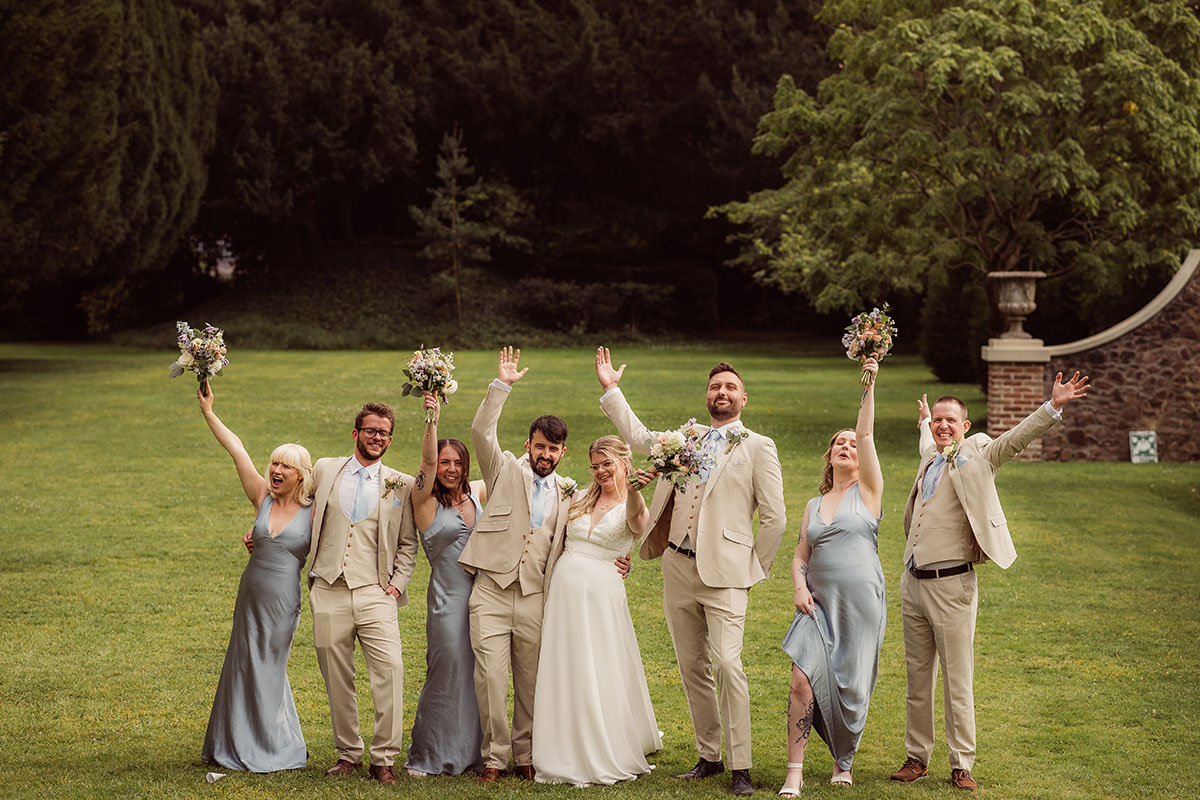 Bride & Groom in the sunshine at Kingscote Barn