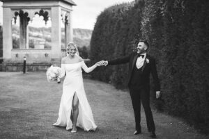 Bride and groom walking and laughing together